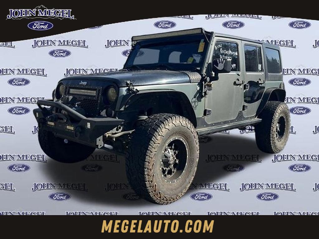 used 2014 Jeep Wrangler Unlimited car, priced at $14,555