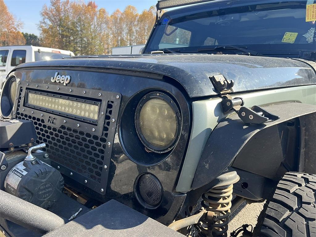 used 2014 Jeep Wrangler Unlimited car, priced at $14,555