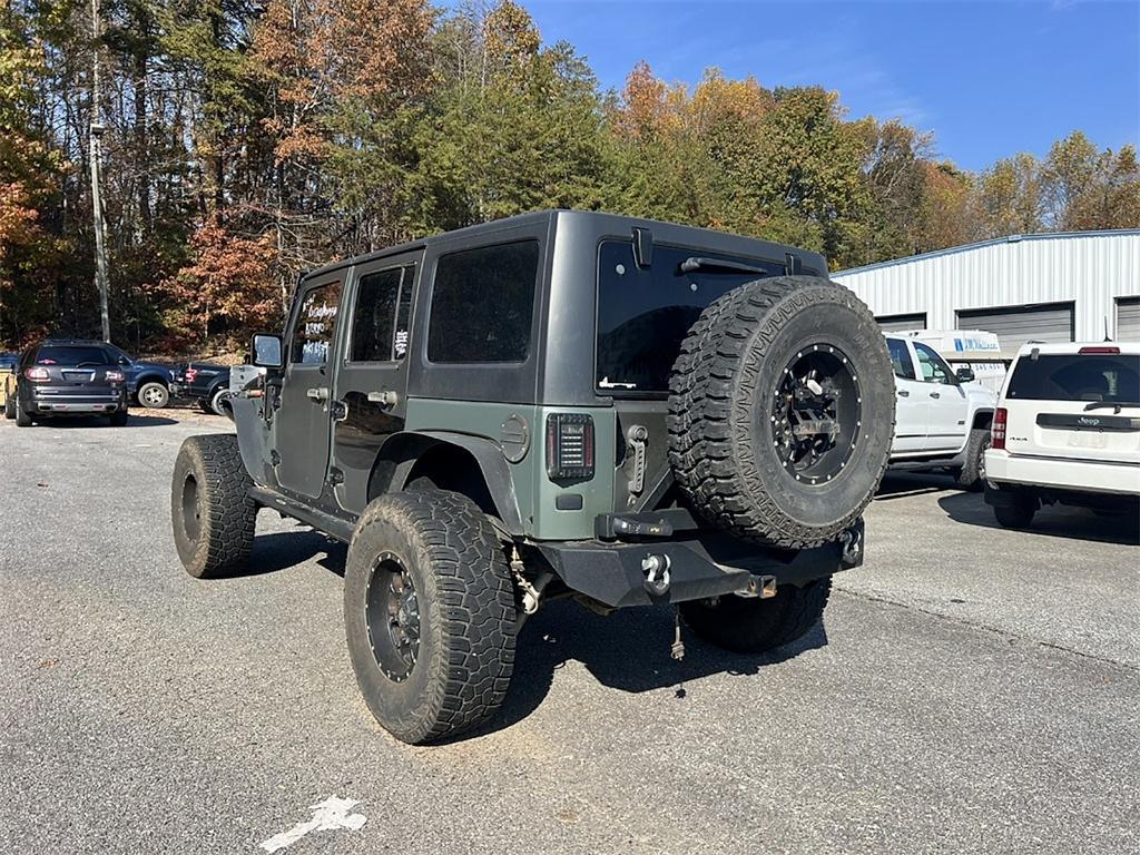 used 2014 Jeep Wrangler Unlimited car, priced at $14,555