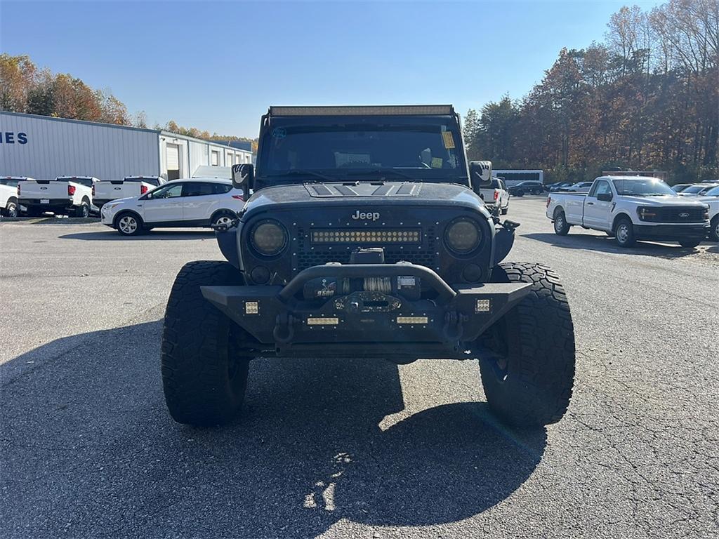 used 2014 Jeep Wrangler Unlimited car, priced at $14,555