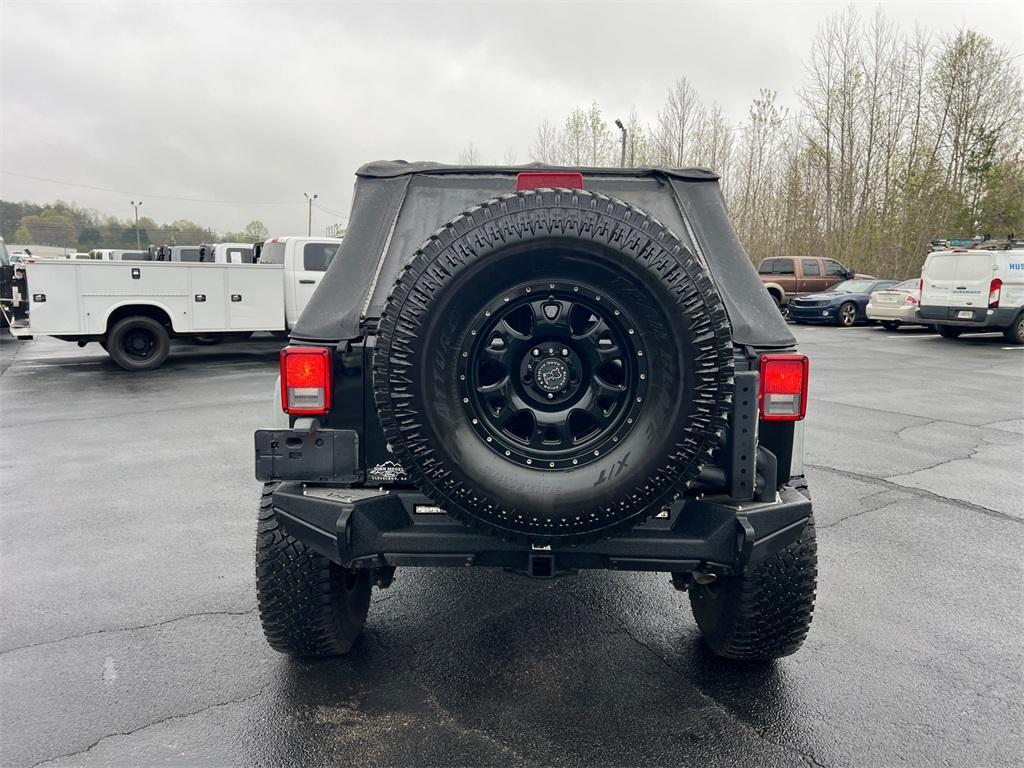used 2011 Jeep Wrangler Unlimited car, priced at $13,897