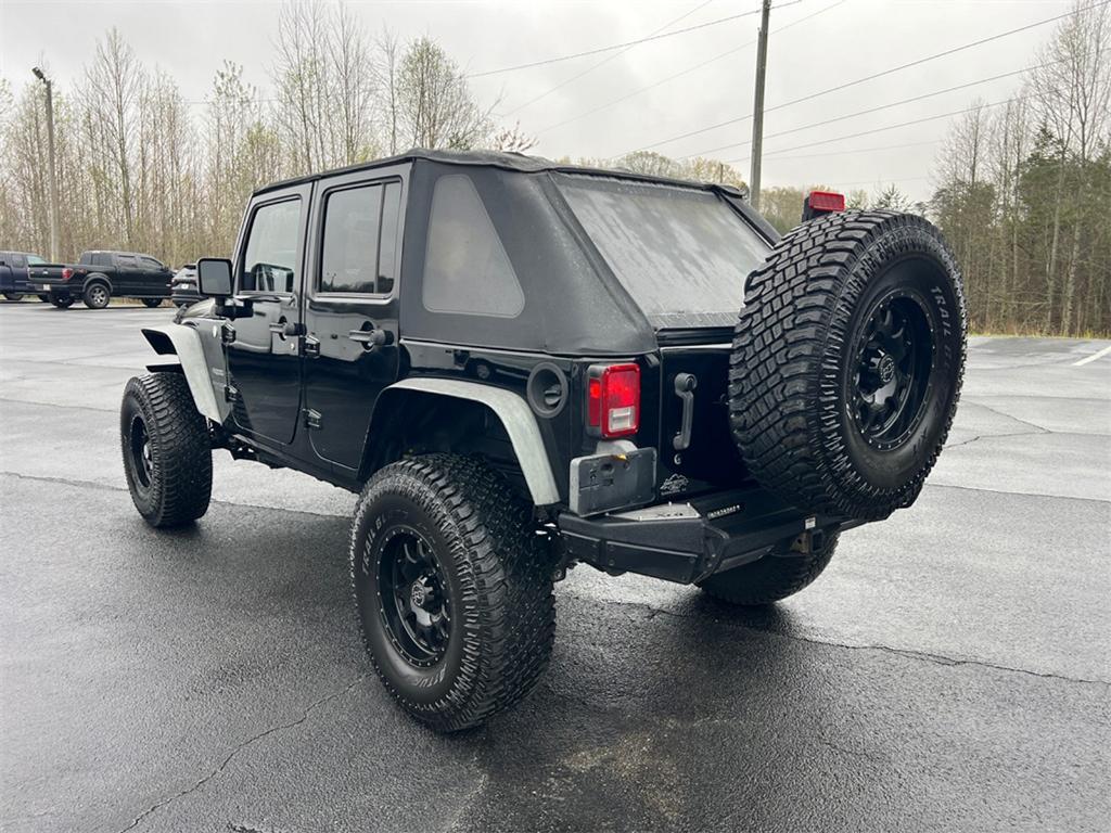 used 2011 Jeep Wrangler Unlimited car, priced at $13,499