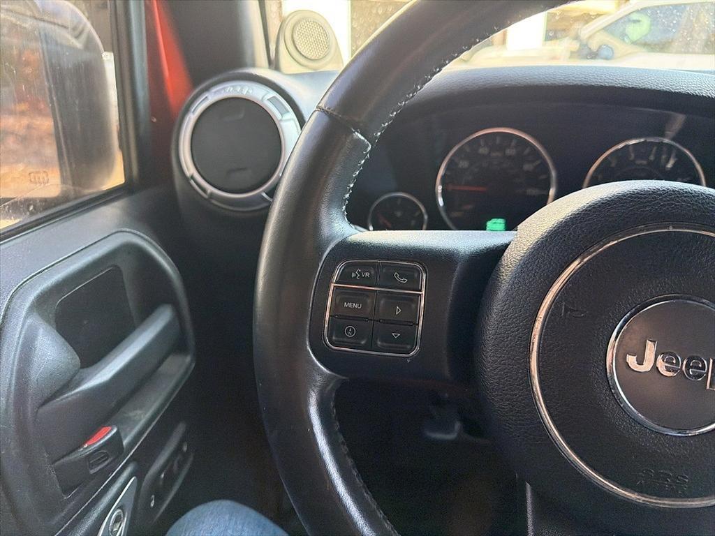used 2014 Jeep Wrangler Unlimited car, priced at $15,677