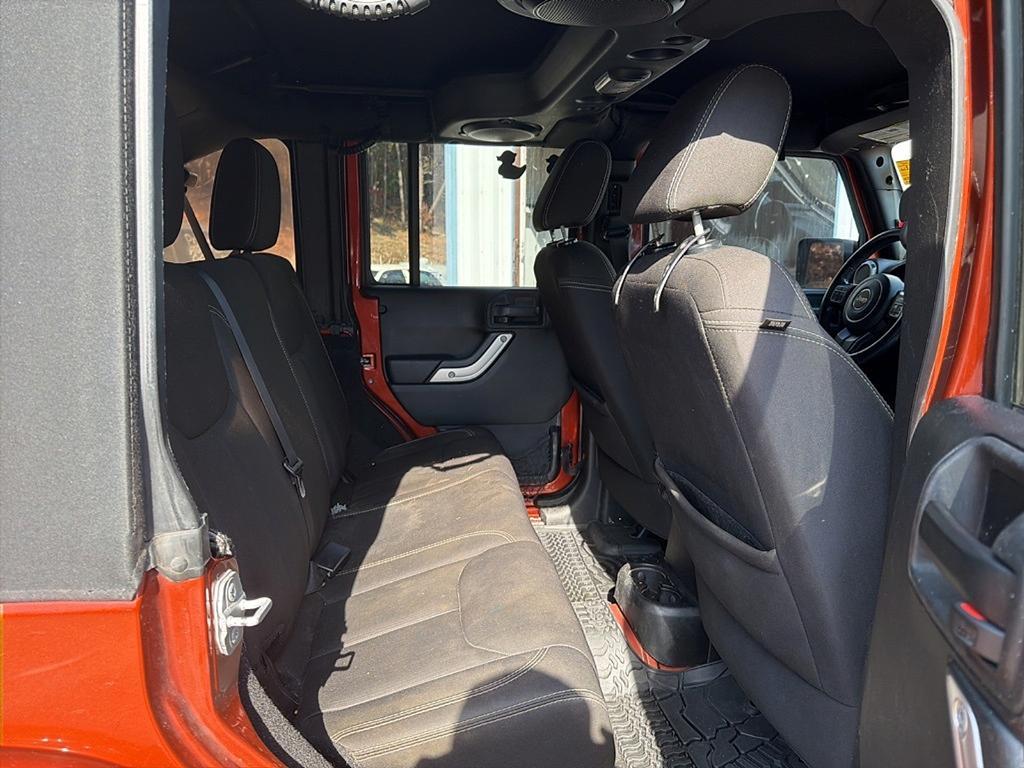 used 2014 Jeep Wrangler Unlimited car, priced at $15,677