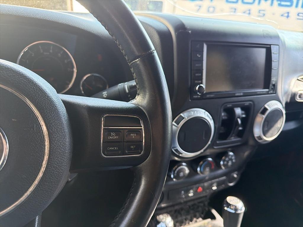 used 2014 Jeep Wrangler Unlimited car, priced at $15,677