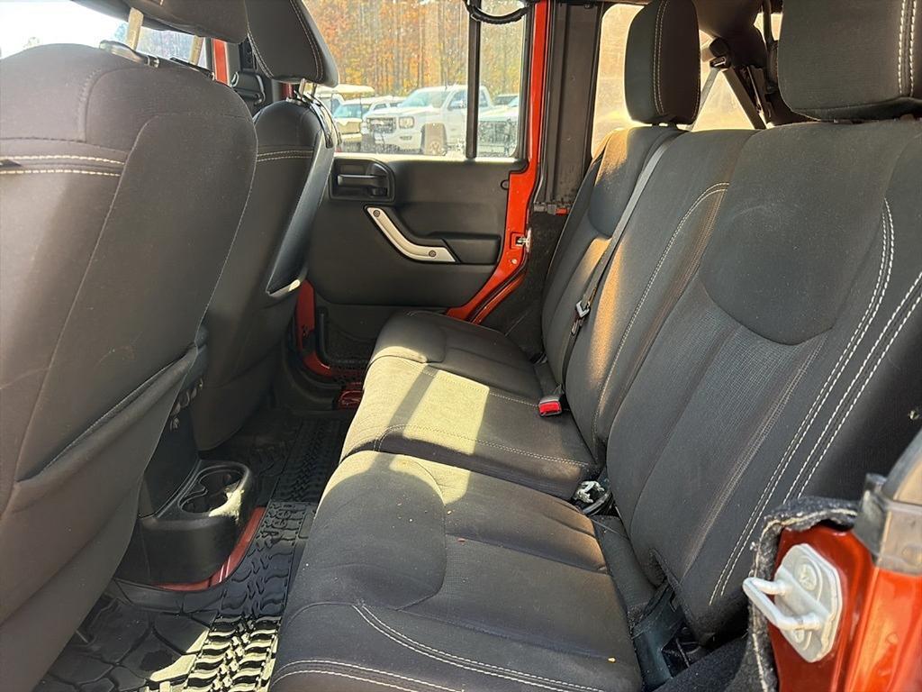 used 2014 Jeep Wrangler Unlimited car, priced at $15,677