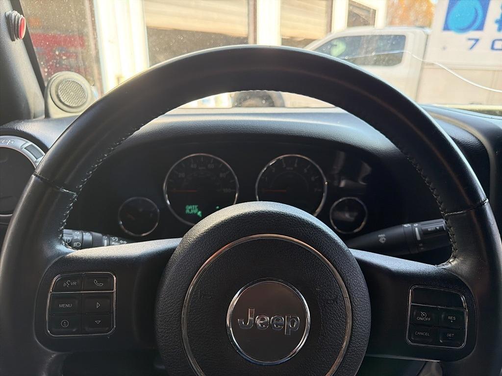 used 2014 Jeep Wrangler Unlimited car, priced at $15,677