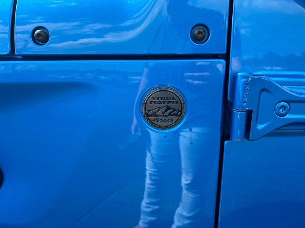 used 2023 Jeep Wrangler car, priced at $27,385