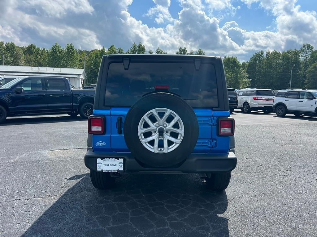 used 2023 Jeep Wrangler car, priced at $27,385