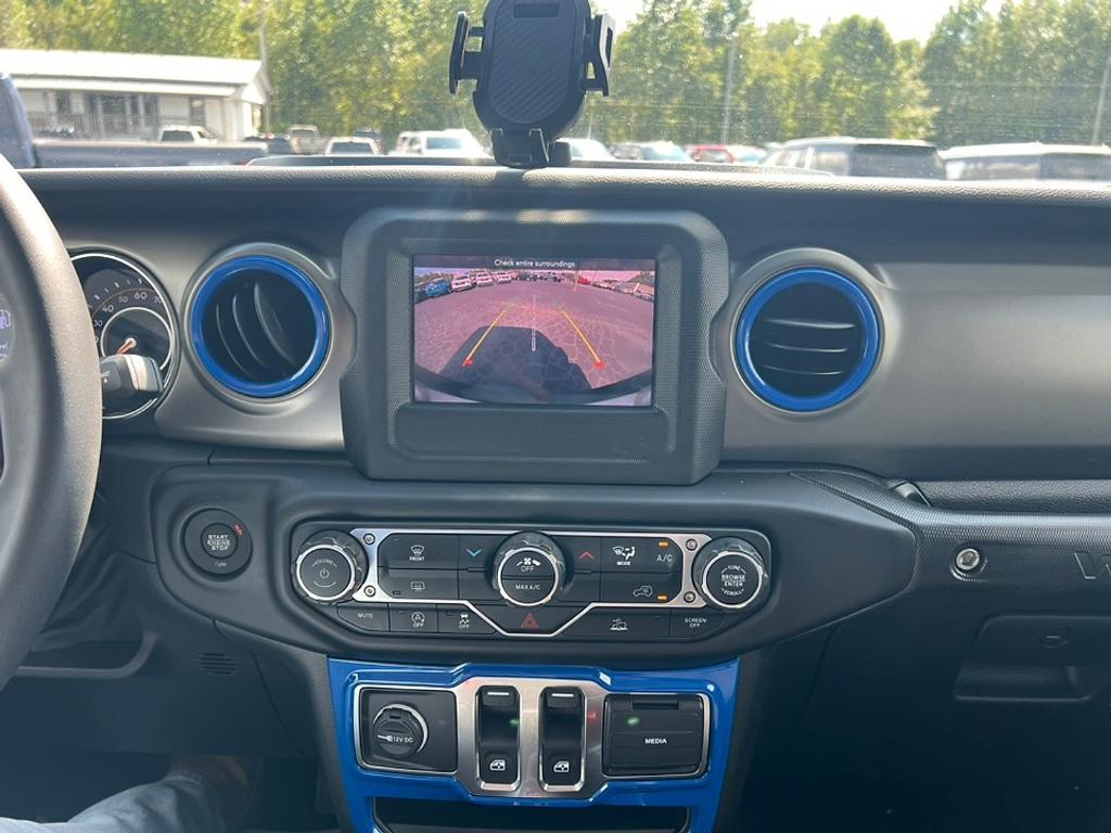 used 2023 Jeep Wrangler car, priced at $27,385