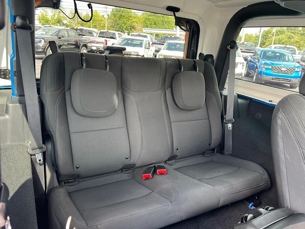 used 2023 Jeep Wrangler car, priced at $27,385