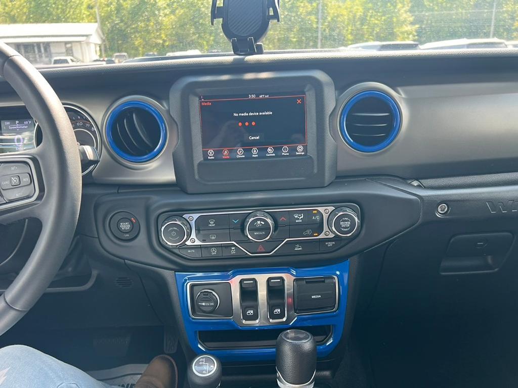 used 2023 Jeep Wrangler car, priced at $27,385