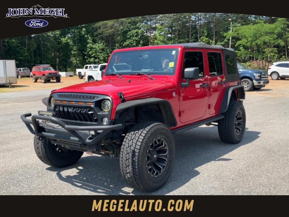 used 2014 Jeep Wrangler Unlimited car, priced at $20,497