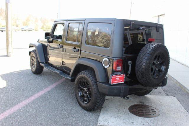 used 2015 Jeep Wrangler Unlimited car, priced at $19,969