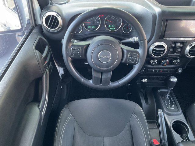used 2015 Jeep Wrangler Unlimited car, priced at $18,999