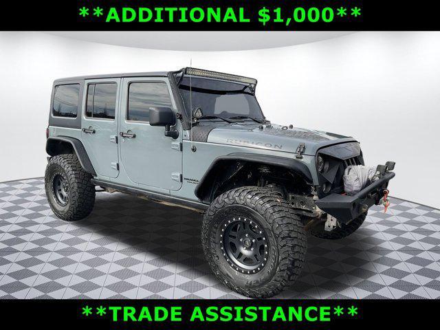 used 2014 Jeep Wrangler Unlimited car, priced at $17,749