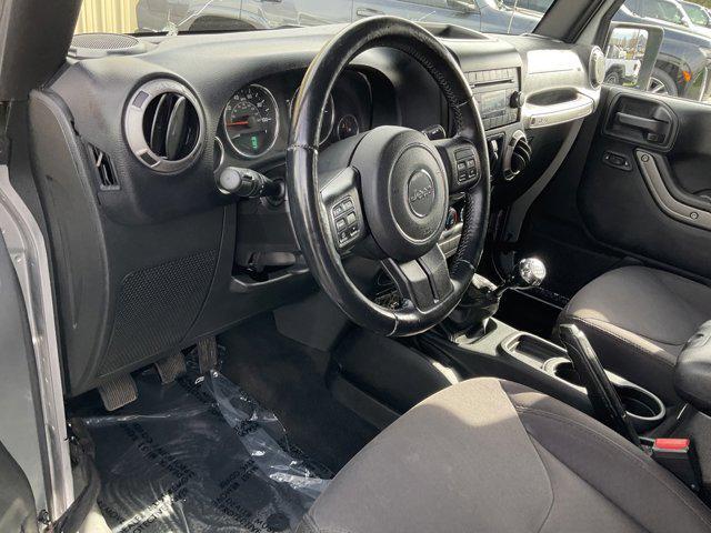 used 2015 Jeep Wrangler Unlimited car, priced at $17,249