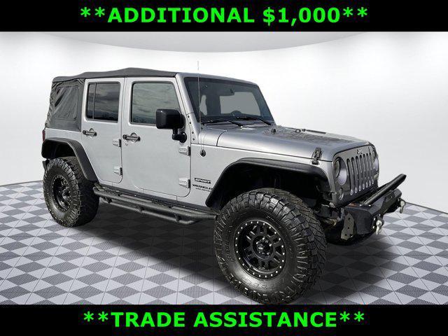 used 2015 Jeep Wrangler Unlimited car, priced at $17,249