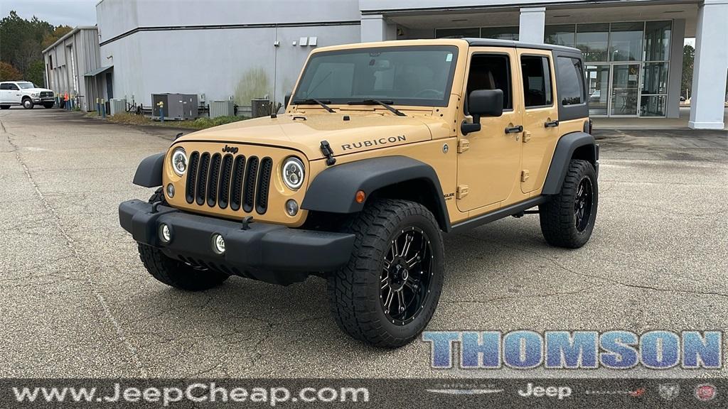 used 2014 Jeep Wrangler Unlimited car, priced at $24,490