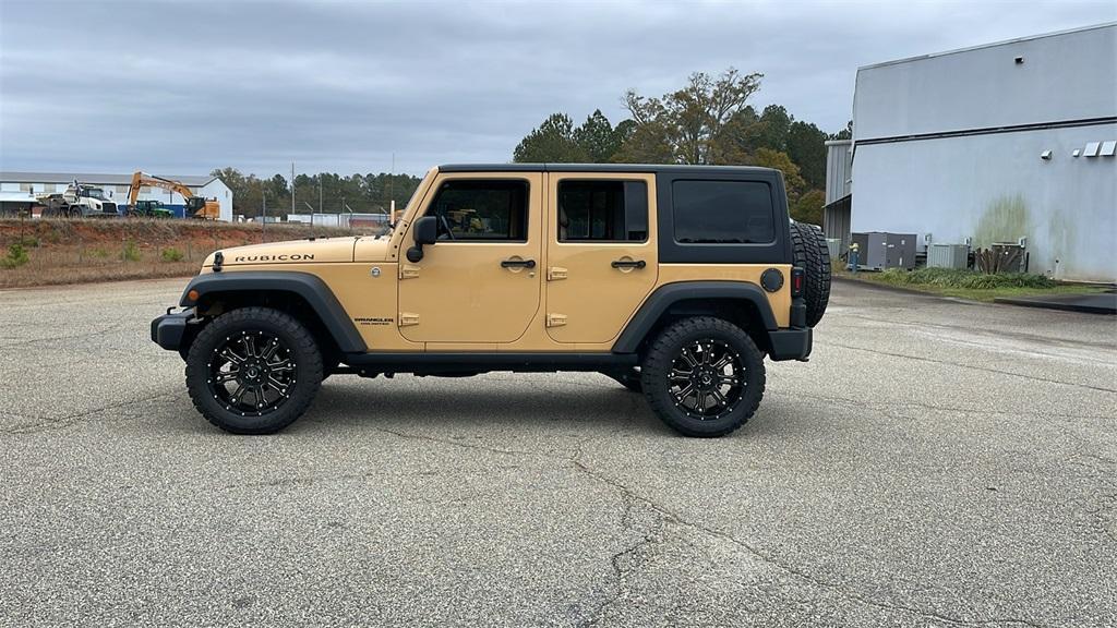 used 2014 Jeep Wrangler Unlimited car, priced at $24,490