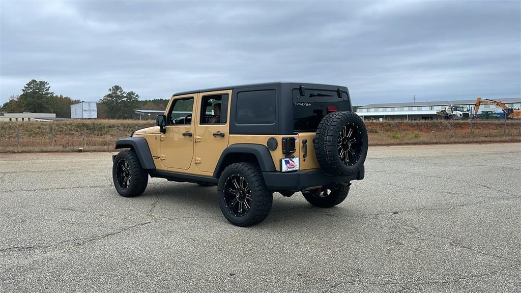 used 2014 Jeep Wrangler Unlimited car, priced at $24,490