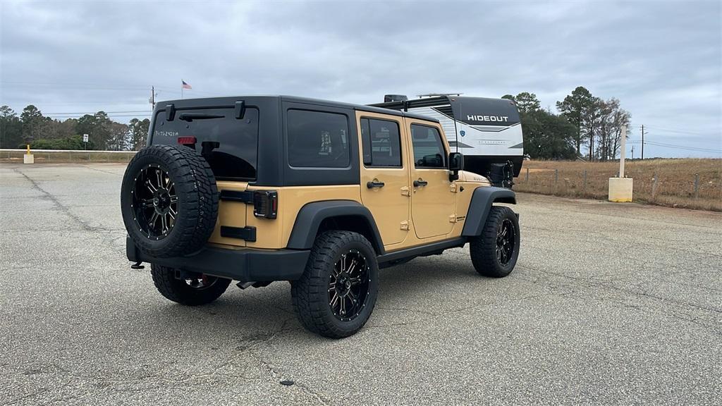 used 2014 Jeep Wrangler Unlimited car, priced at $24,490