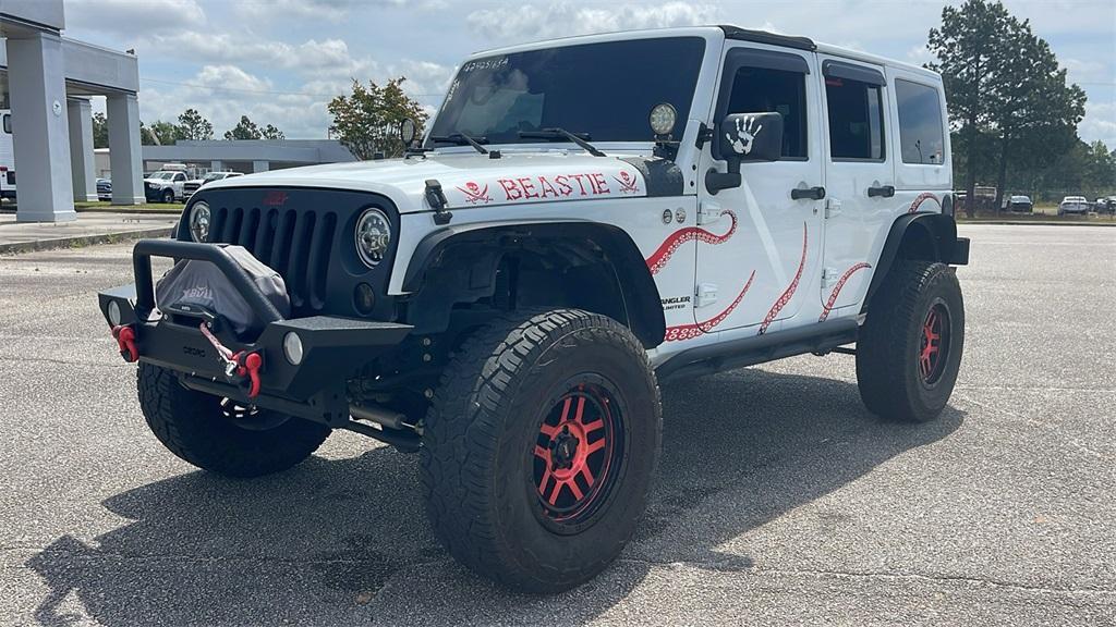 used 2016 Jeep Wrangler Unlimited car, priced at $22,660