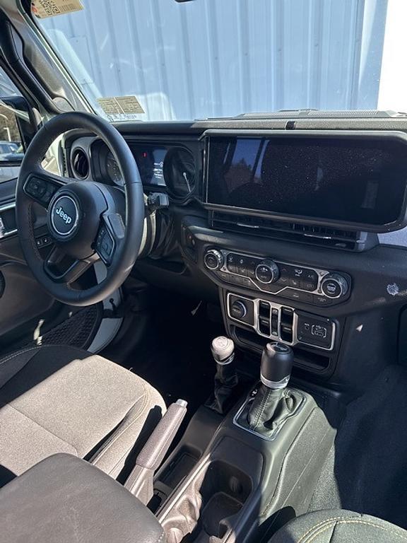 used 2024 Jeep Wrangler 4xe car, priced at $30,618