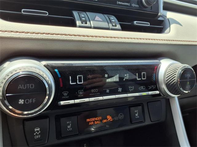 used 2021 Toyota RAV4 Hybrid car, priced at $33,989