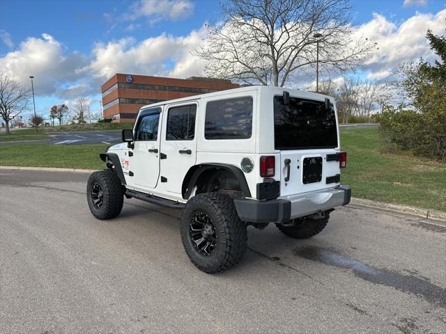 used 2013 Jeep Wrangler Unlimited car, priced at $13,995