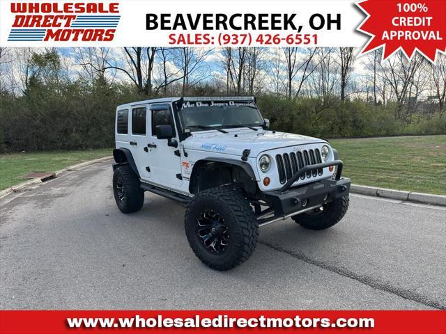 used 2013 Jeep Wrangler Unlimited car, priced at $13,995