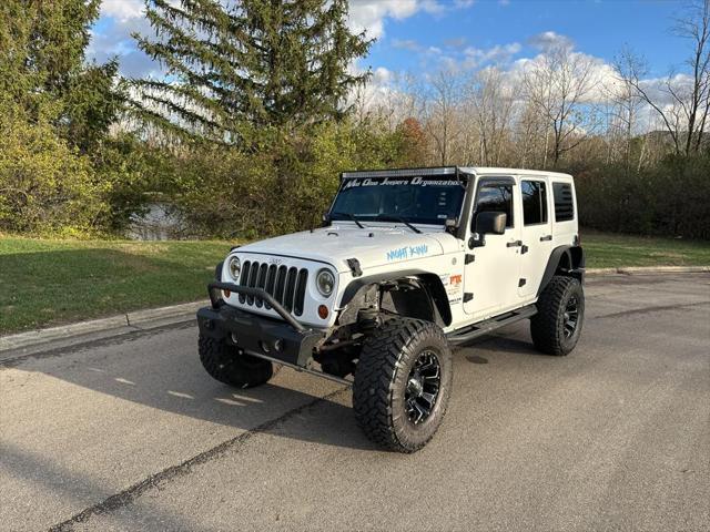 used 2013 Jeep Wrangler Unlimited car, priced at $13,995