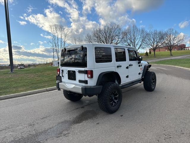 used 2013 Jeep Wrangler Unlimited car, priced at $13,995