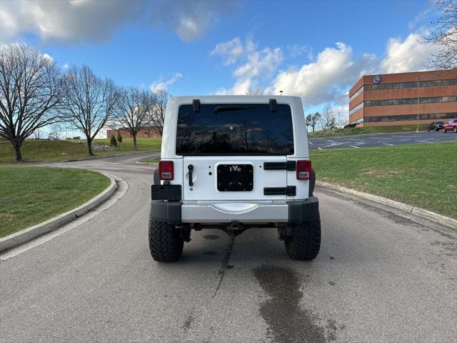 used 2013 Jeep Wrangler Unlimited car, priced at $13,995