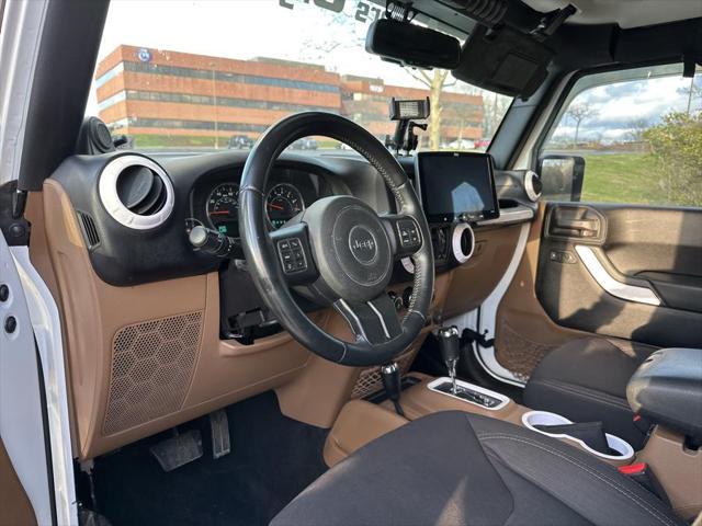 used 2013 Jeep Wrangler Unlimited car, priced at $13,995