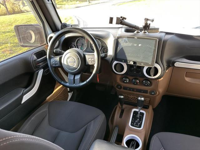 used 2013 Jeep Wrangler Unlimited car, priced at $13,995