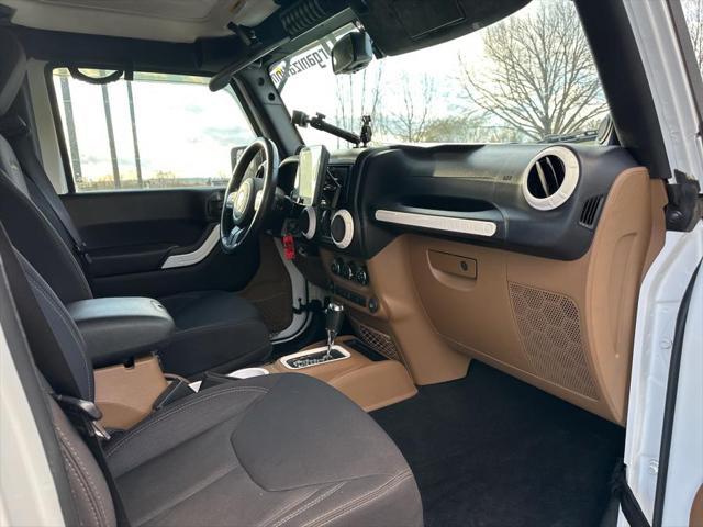 used 2013 Jeep Wrangler Unlimited car, priced at $13,995