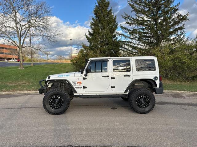 used 2013 Jeep Wrangler Unlimited car, priced at $13,995