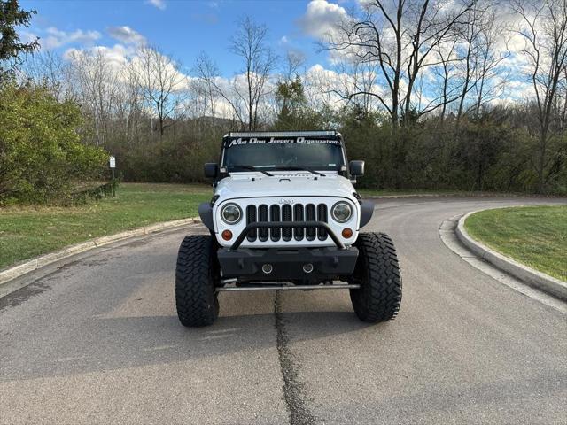 used 2013 Jeep Wrangler Unlimited car, priced at $13,995