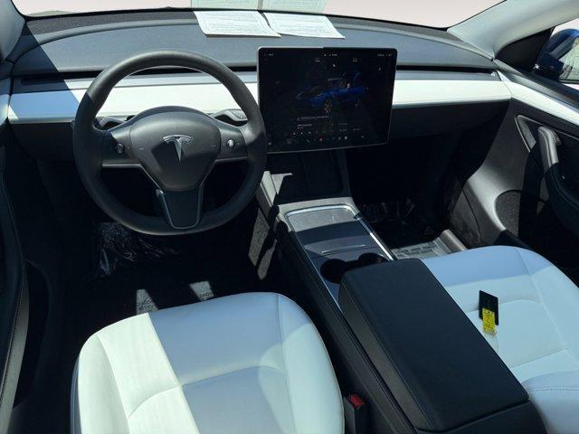 used 2023 Tesla Model Y car, priced at $34,450