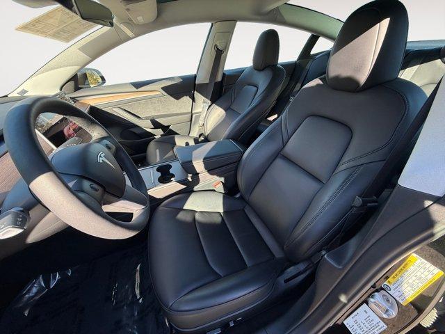 used 2023 Tesla Model 3 car, priced at $27,950