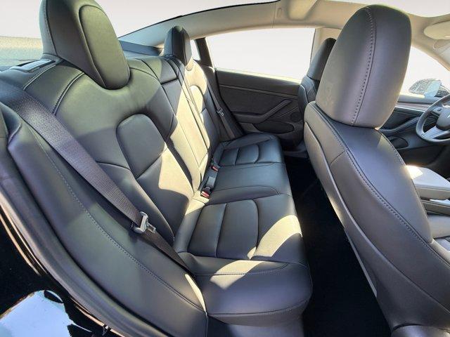 used 2023 Tesla Model 3 car, priced at $27,950