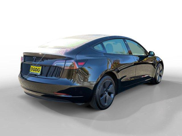 used 2023 Tesla Model 3 car, priced at $27,950
