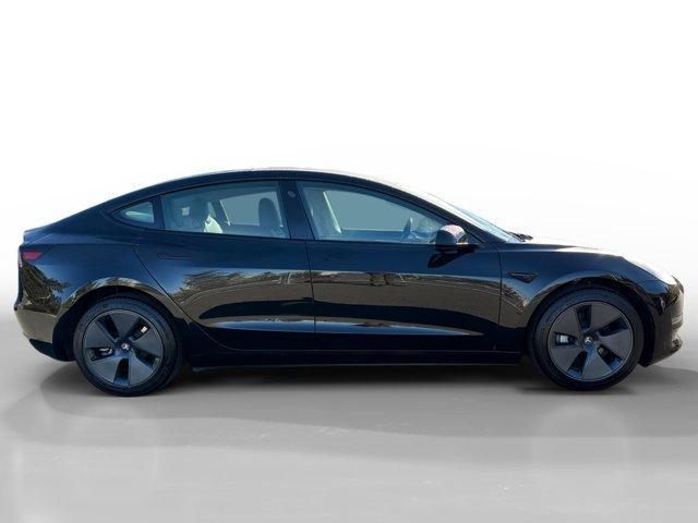 used 2023 Tesla Model 3 car, priced at $27,950