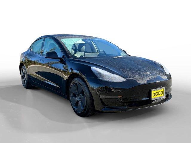 used 2023 Tesla Model 3 car, priced at $27,950