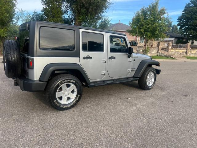 used 2014 Jeep Wrangler Unlimited car, priced at $18,999