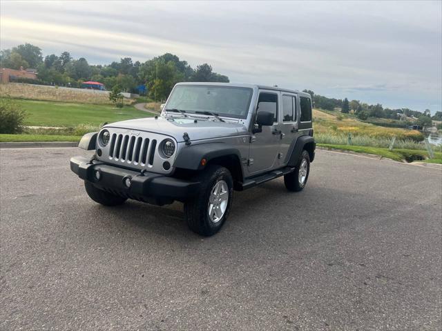 used 2014 Jeep Wrangler Unlimited car, priced at $18,999