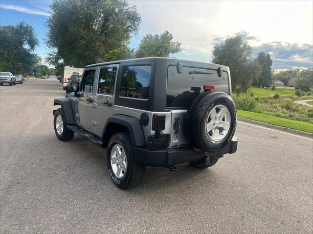 used 2014 Jeep Wrangler Unlimited car, priced at $18,999