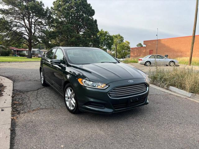 used 2015 Ford Fusion car, priced at $11,999