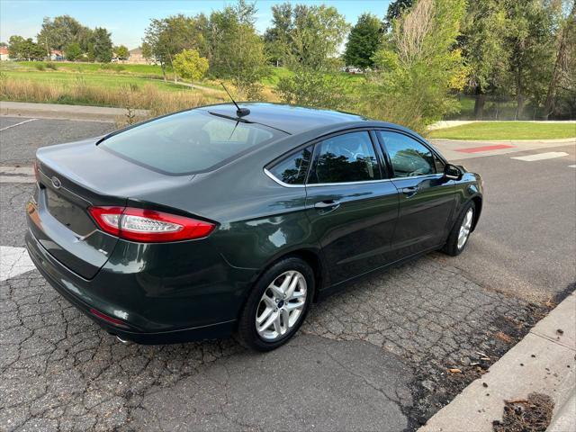 used 2015 Ford Fusion car, priced at $11,999